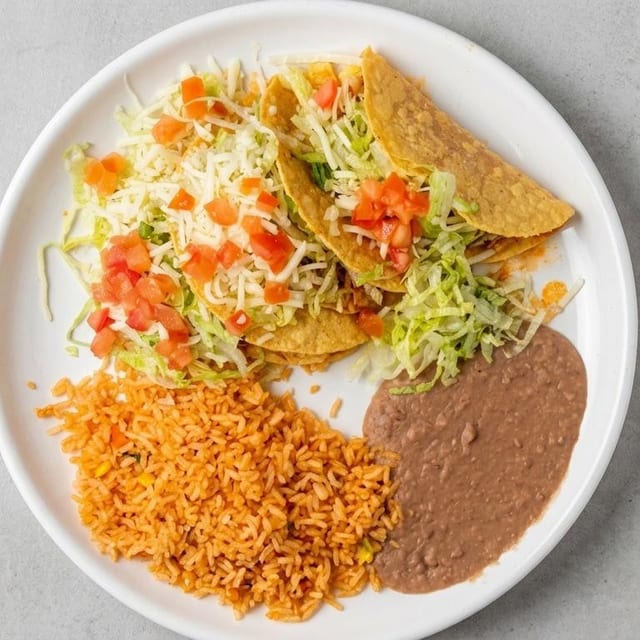 11. Tacos (3) Hard Shell or Soft Chicken or Beef.